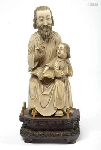 "Saint Joseph et l'Enfant Jésus" en ivoire sc...