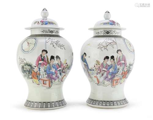 A PAIR OF CHINESE POLYCHROME ENAMELED PORCELAIN JARS WITH LI...