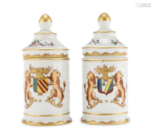 A PAIR OF CHINESE POLYCHROME DECORATED PORCELAIN CONTAINERS,...