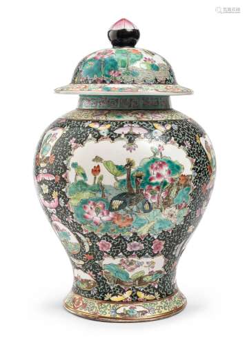 A CHINESE POLYCHROME ENAMELED PORCELAIN JAR WITH LID, 20TH C...