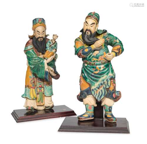 A PAIR OF CHINESE POLYCHROME PORCELAIN SCULPTURES DEPICTING ...