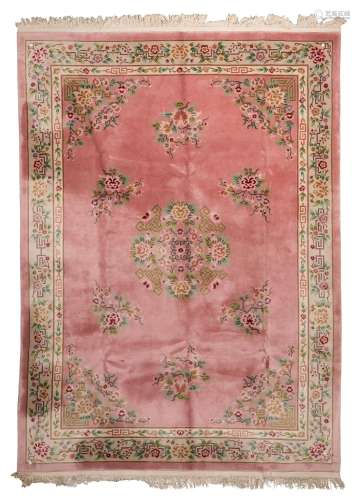 A BEIJING CARPET WITH PINK GROUND, FIRST HALF 20TH CENTURY.