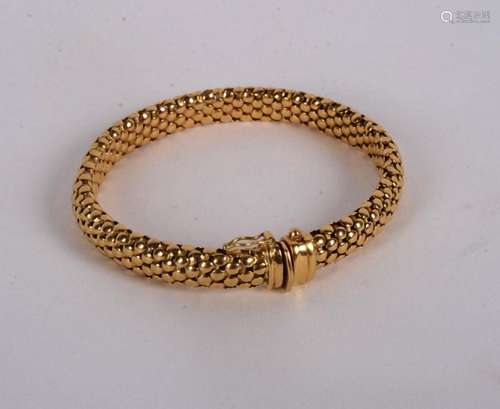 Bracelet esclave en or 18K.