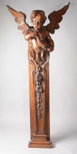 Tête d'ange en bois sculpté.