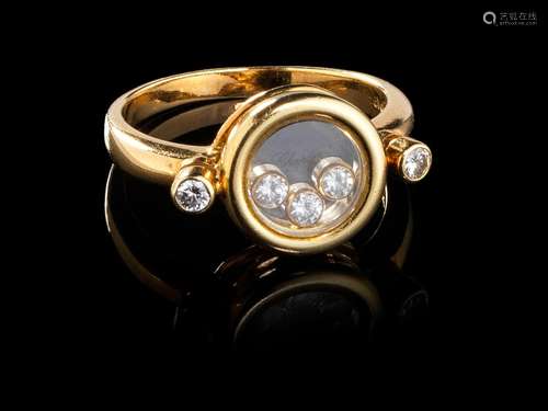 Chopard, Happy Diamonds, bague ronde retenant trois diamants...