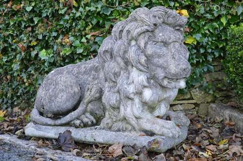 PAIR OF ESTATE LIFESIZE COMPOSITE STONE LIONS