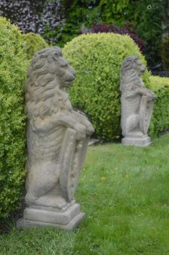 PAIR OF MOULDED STONE ARMORIAL LION