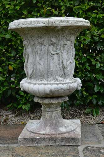 PAIR OF MOULDED STONE GARDEN URNS