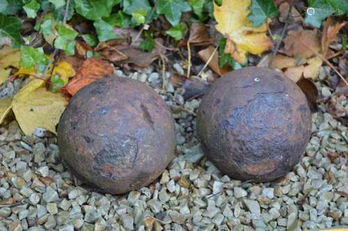 TWO EARLY CAST IRON CANON BALLS