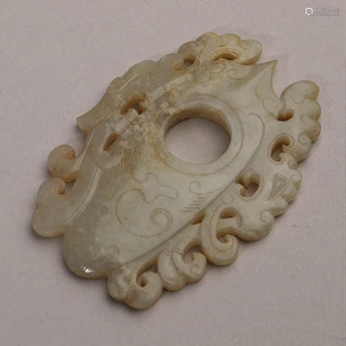 A Carved Celadon Jade Pendant