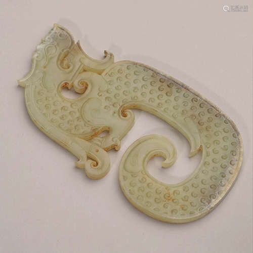 A Carved Jade S-Shape Pendant