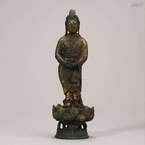 A Bronze Figure of Standing Buddha