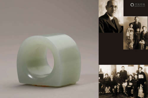 A Carved Celadon Jade Thumb Ring