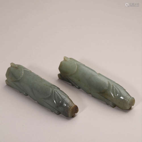 A Pair of Celadon Jade Carvings of Hog