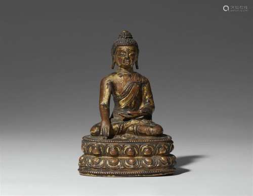 A Tibetan gilt bronze figure of Buddha Shakyamuni. 15th/16th...