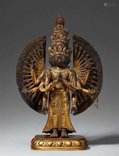 A large and exquisite casted gilt bronze figure of Avalokite...