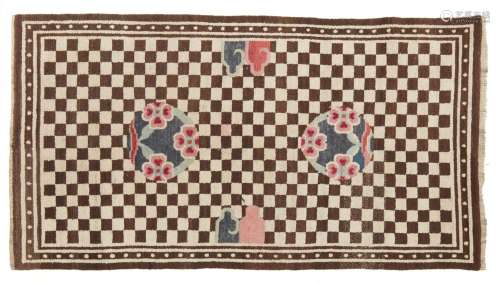 A Tibetan wool checkered rug. Early 20th century