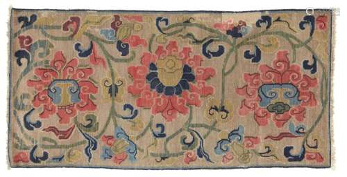 A Tibetan wool lotos rug. Early 20th century