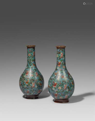 Two slender champlevé enamel vases. Late 19th century