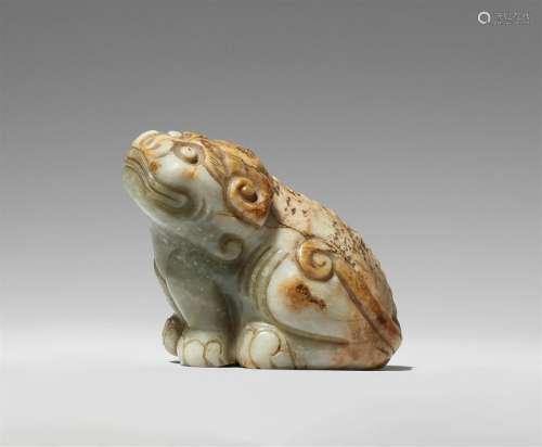 A celadon and russet jade carving of a mythical beast. 18th/...