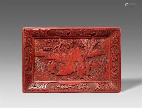 A carved red lacquer rectangular tray. 19th century