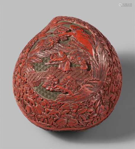 A carved red lacquer peach-shaped lidded box. 19th century