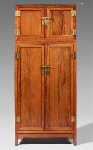 A pair of possibly huanghuali wood compound wardrobes with a...
