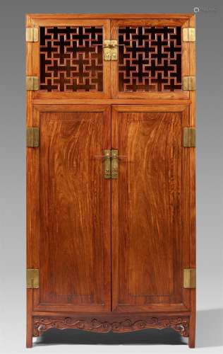 A pair of huanghuali wood square-corner cabinets. 19th/20th ...