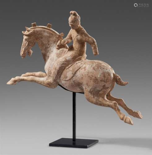 A pottery figure of a polo player. Tang dynasty (618–907)