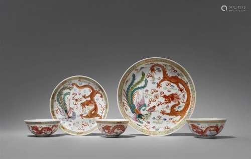 Five famille rose dragon and phoenix dishes and bowls. Early...