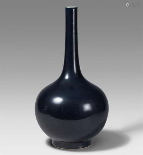 A large blueish-black-glazed bottle vase. 20th century