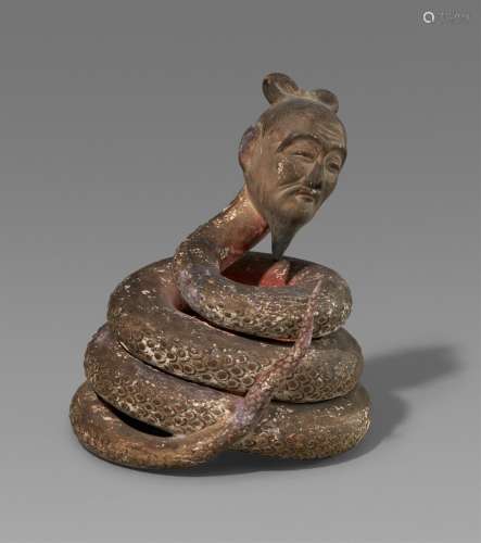 A polychromed wood figure of a male Ugajin. 18th/19th centur...