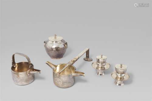 A group of silver ware used for a wedding ceremony. Late 19t...