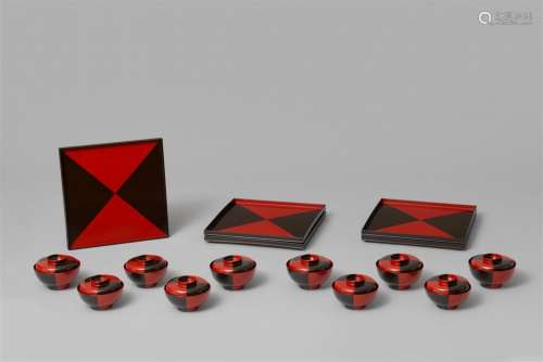 Ten lacquered wood lidded bowls and five trays. Dated 1845