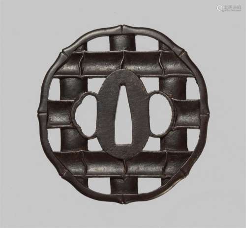 An iron tsuba. Late 18th century
