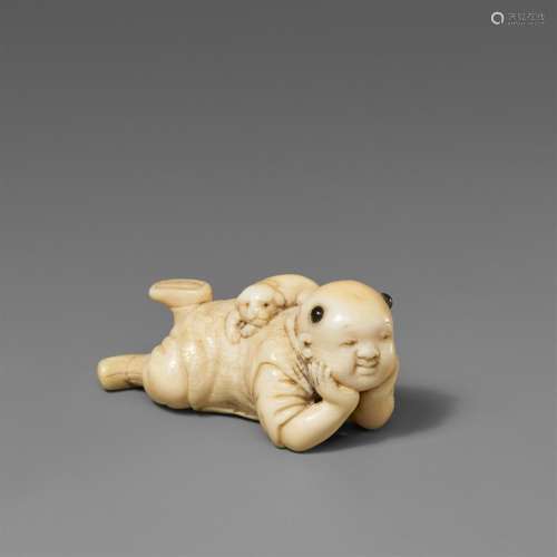 An ivory netsuke of a karako with a puppy. Late 19th century