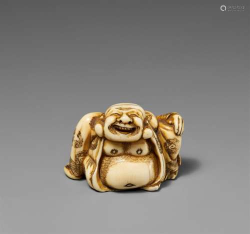 A large ivory netsuke of a laughing Hotei. Around 1800