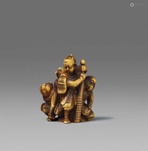 A stained ivory netsuke of Momotaro und his friends. 2nd hal...