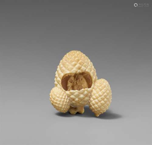 An ivory netsuke of three pine cones ans Jo and Uba. Second ...