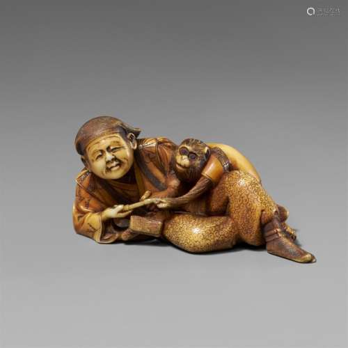 A stained ivory netsuke of a resting sarumawashi. Late 19th ...