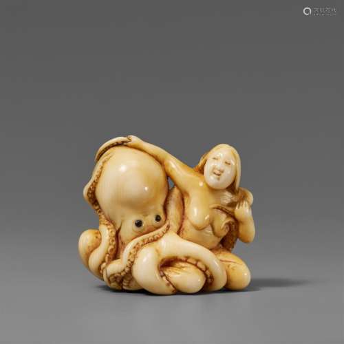 An ivory shunga netsuke of an awabi diver and octopus in amo...