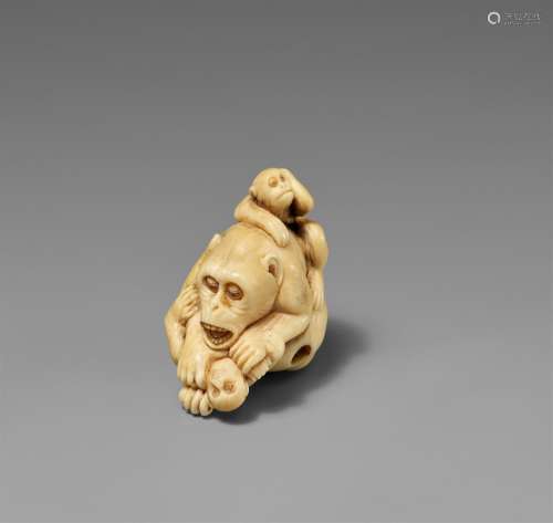 An ivory netsuke of a group of monkeys. Late 19th century