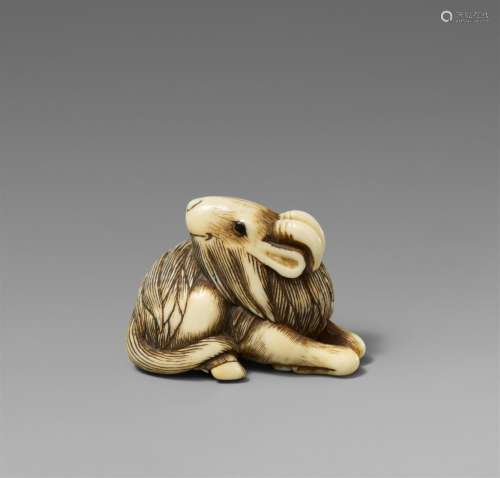 An ivory netsuke of a long-haired goat. Early 19th century