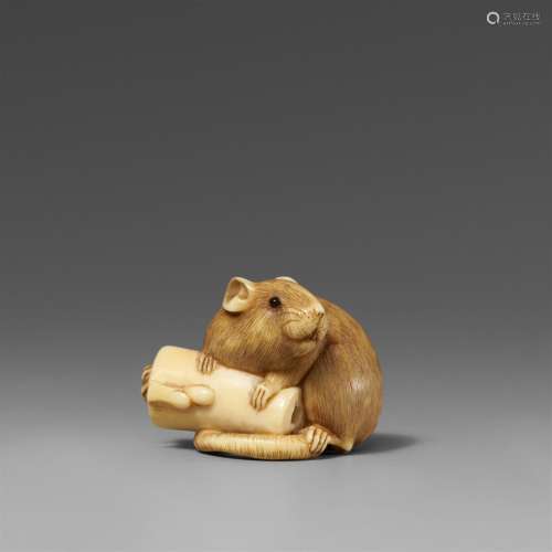 An ivory netsuke of a rat with a candle. First half 19th cen...