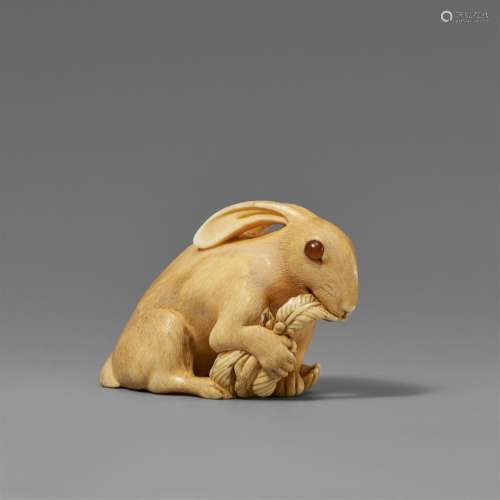 An ivory netsuke of a large hare. 19th century