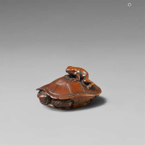 A boxwood netsuke of a tortoise and a frog. 19th century