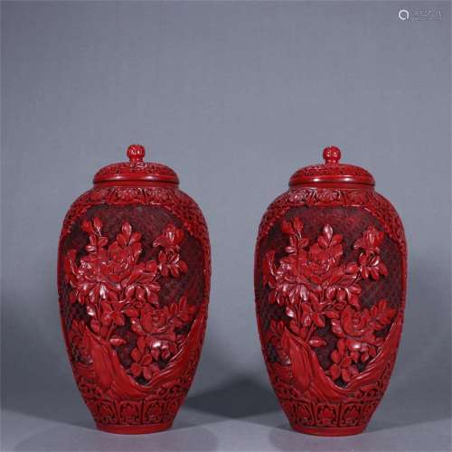 Pair of Chinese Carved Lacquer Jars with Flower