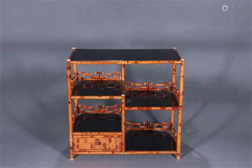 A Chinese Carved Bamboo Storage Rack