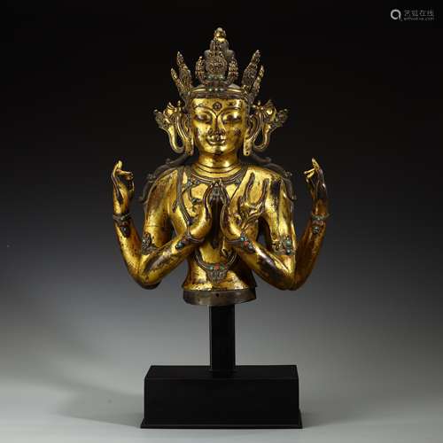 Copper-gilded Buddha statues inlaid with precious stones in ...