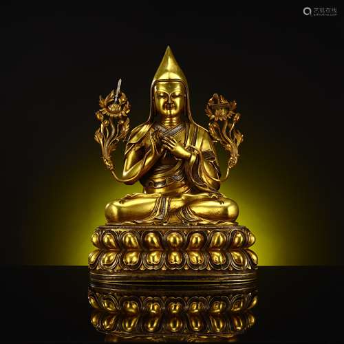 Bronze-gilded guru statue